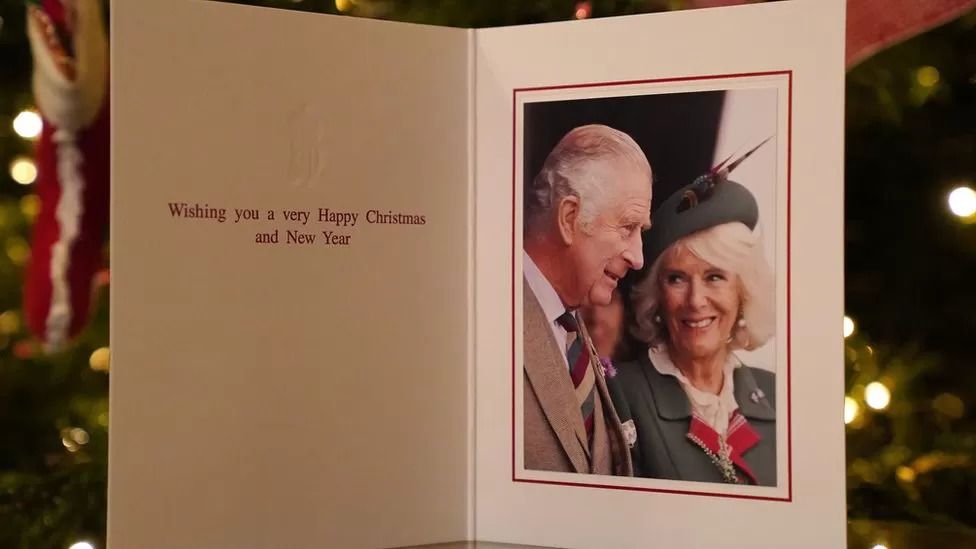 King Charles and Camilla's Christmas card shows pair at Highland Games
