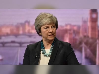 Do not reduce UK's modern slavery protections, Theresa May warns