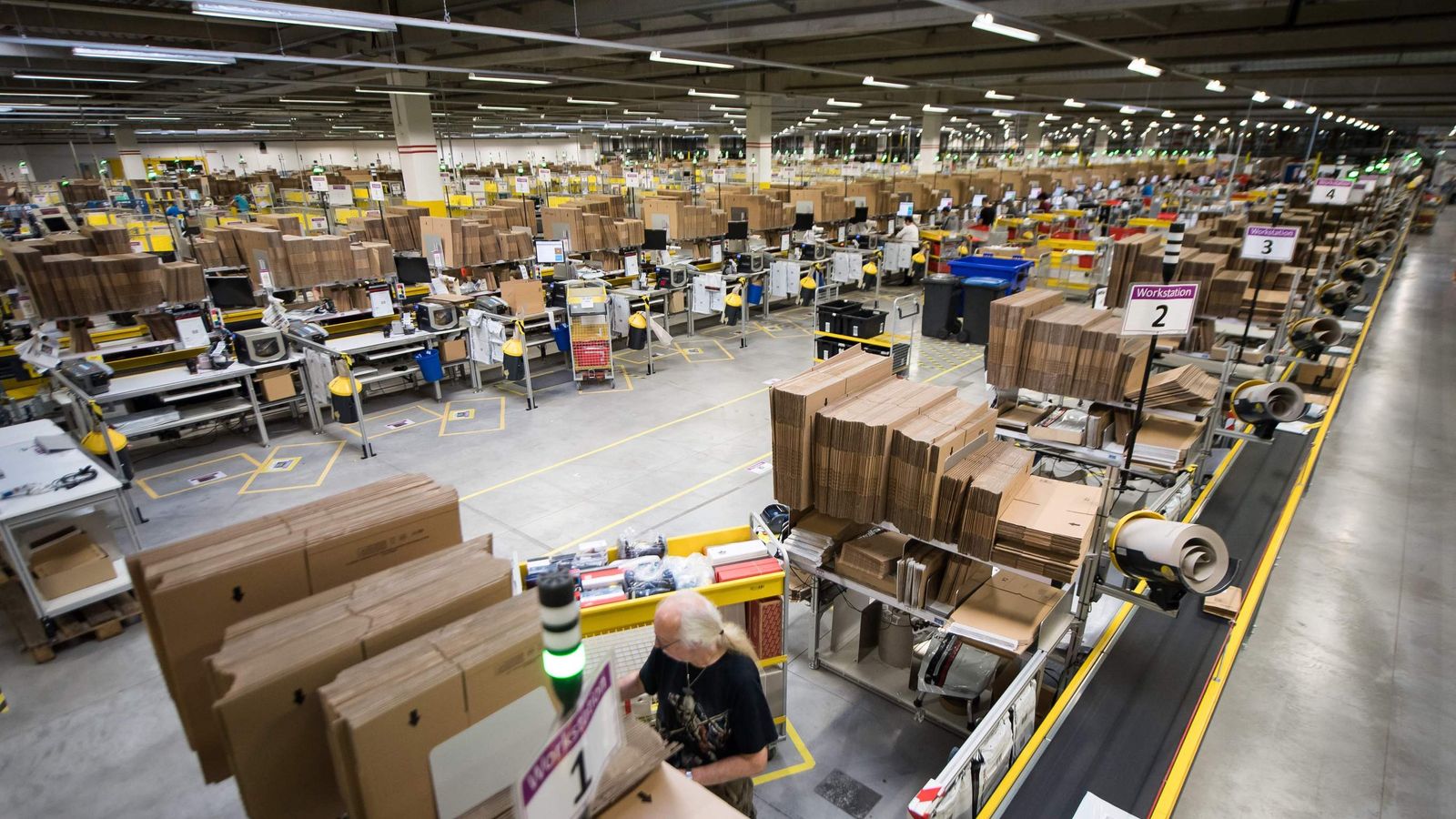 Amazon UK workers set to strike for first time in pay dispute
