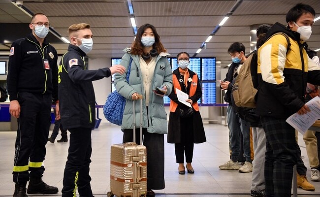 China Ends Quarantine For Overseas Travellers
