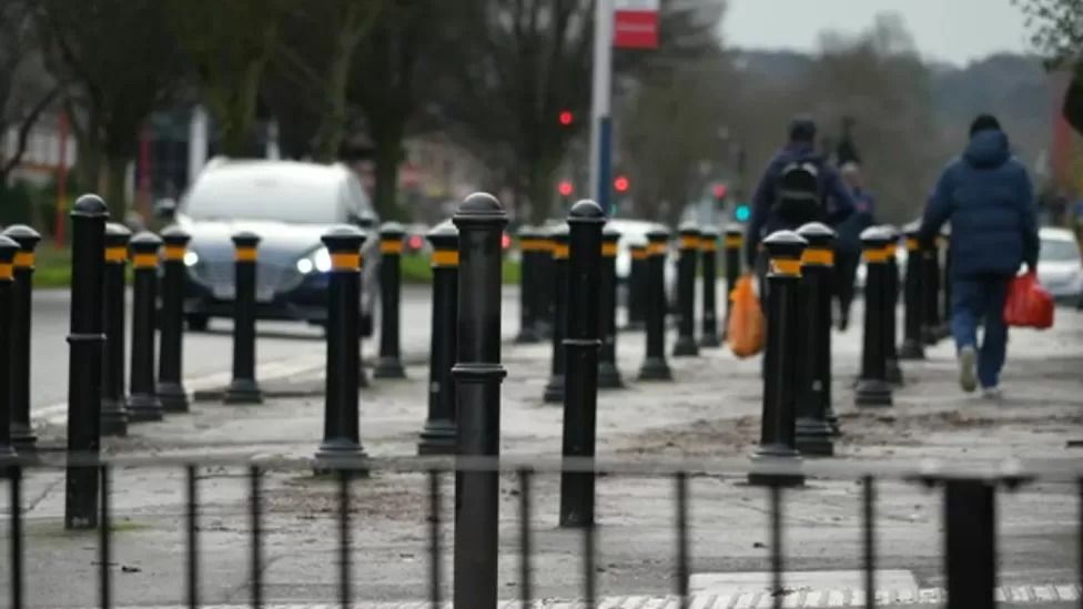 Birmingham council defends dozens of bollards on pavement