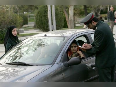 Iran issues warning on mandatory headscarf in cars: Media