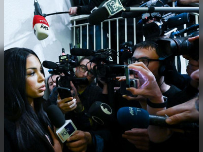 Italy's Berlusconi acquitted in starlet bribery trial