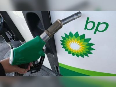 BP scales back climate targets as profits hit record