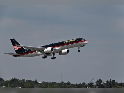 Trump lands in New York to face charges in ‘hush money’ probe