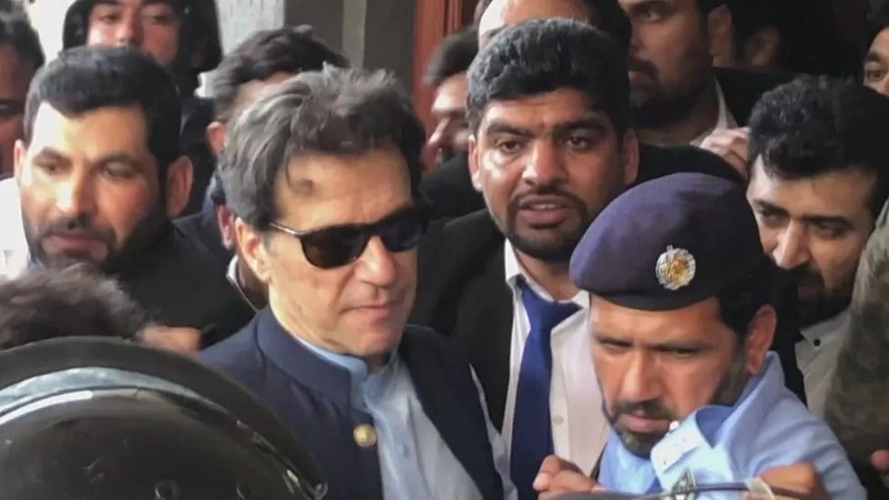 Imran Khan leaves court after being granted bail