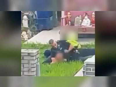 Porthmadog: Police officer suspended after punching video