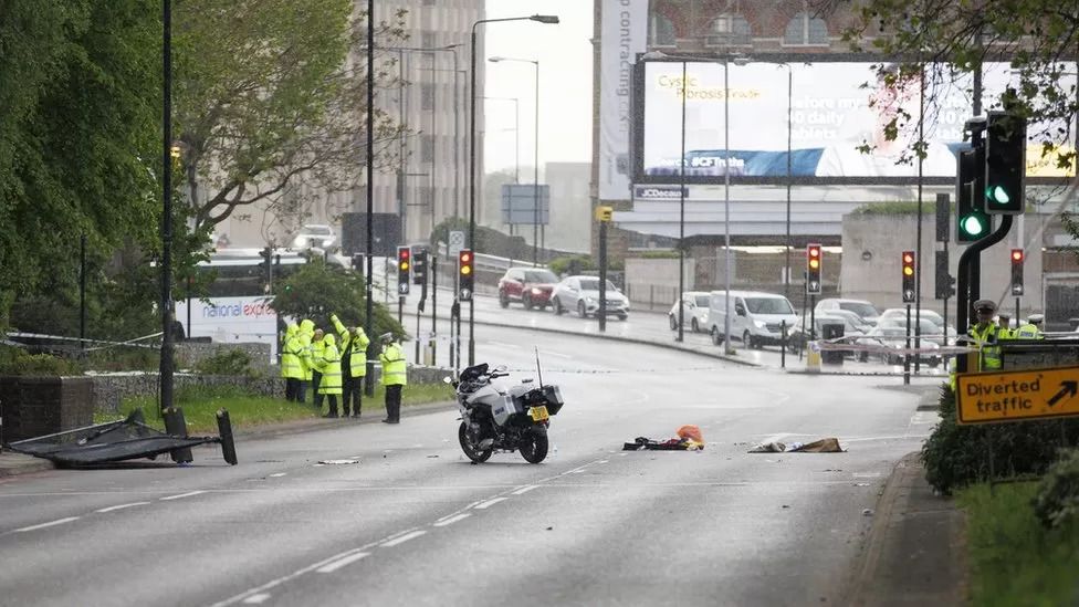 Woman injured in royal police escort crash