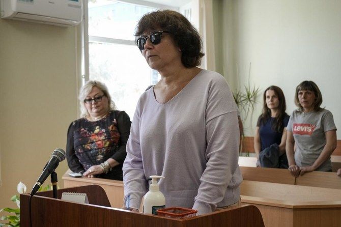 Russian woman who left note on grave of Putin’s parents convicted amid dissent crackdown