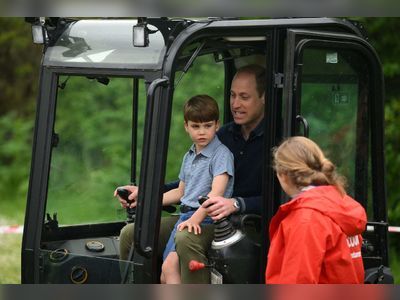 Prince Louis drives a digger as he joins volunteering efforts