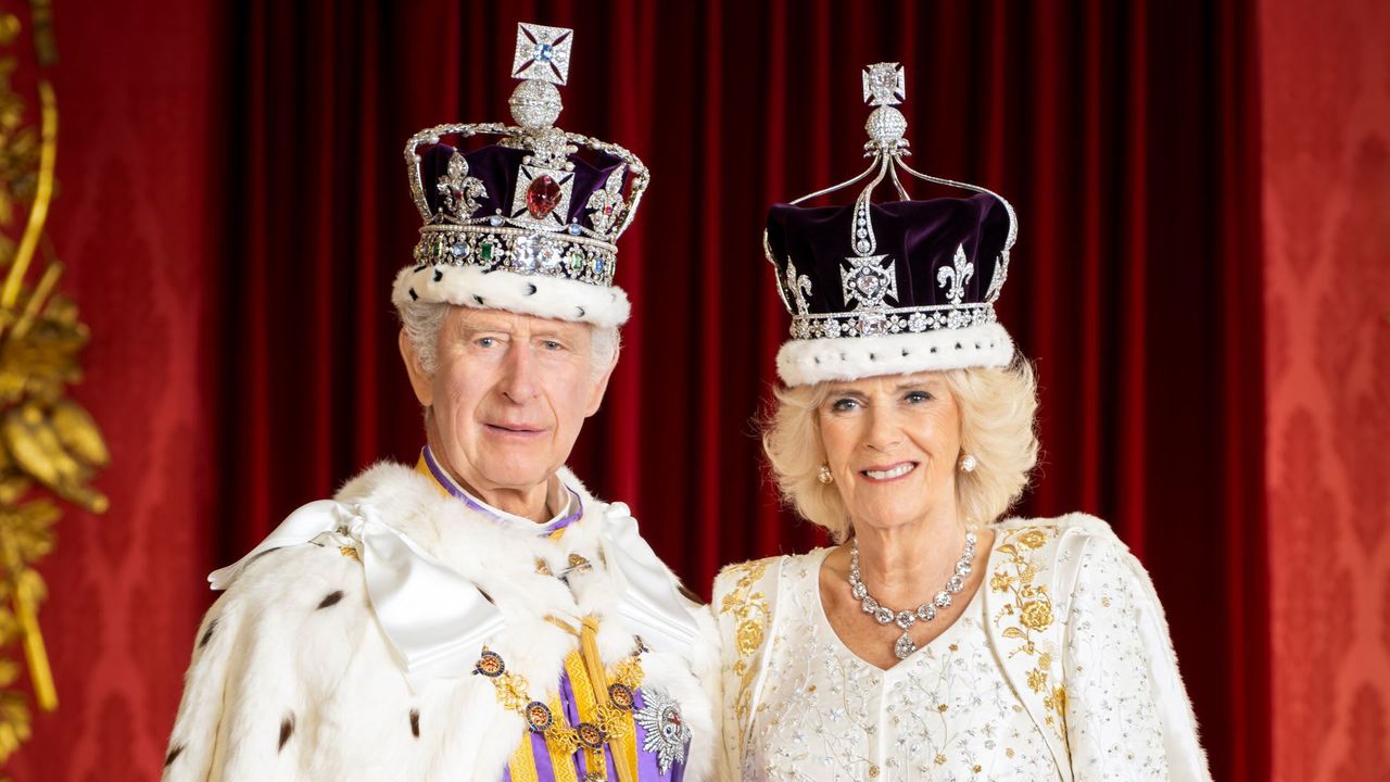 King Charles and Queen Camilla pose in royal regalia for official portraits