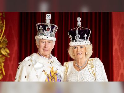 King Charles and Queen Camilla pose in royal regalia for official portraits