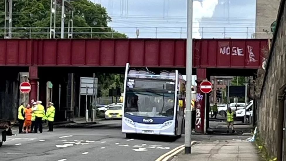 Ten in hospital after bus roof cut off in Glasgow bridge crash