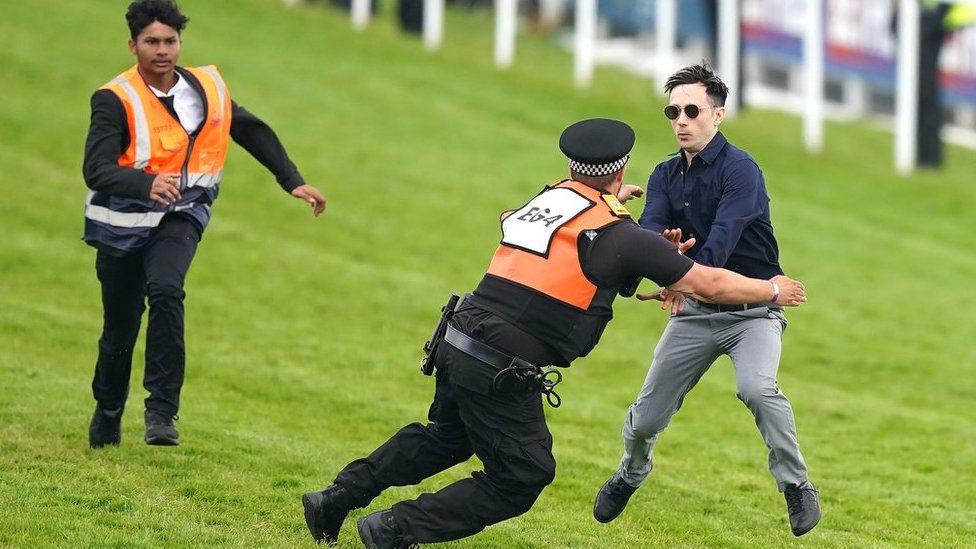 Surrey Police Charge Man with Causing Public Nuisance After Epsom Derby Protest