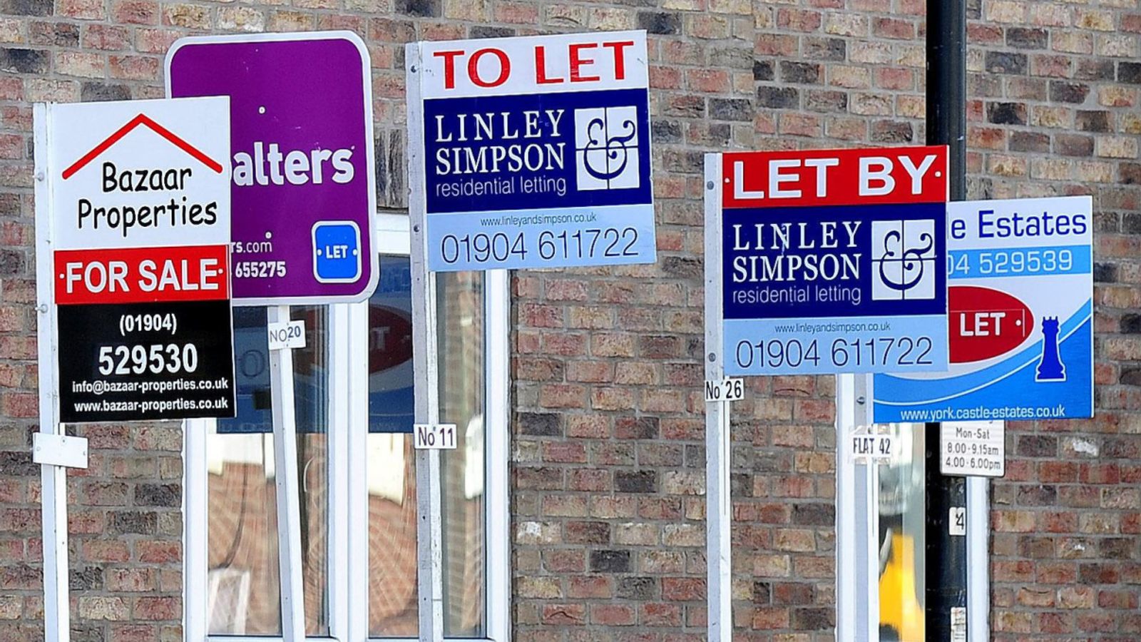 UK house prices record first annual fall in over a decade amid economic downturn