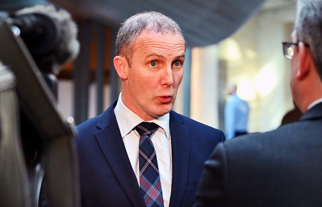 Why did former minister Michael Matheson resign amid an iPad expense scandal?