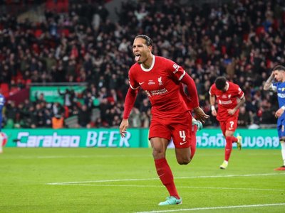 Virgil van Dijk's late header secured a dramatic Carabao Cup final victory for a depleted Liverpool over Chelsea at Wembley